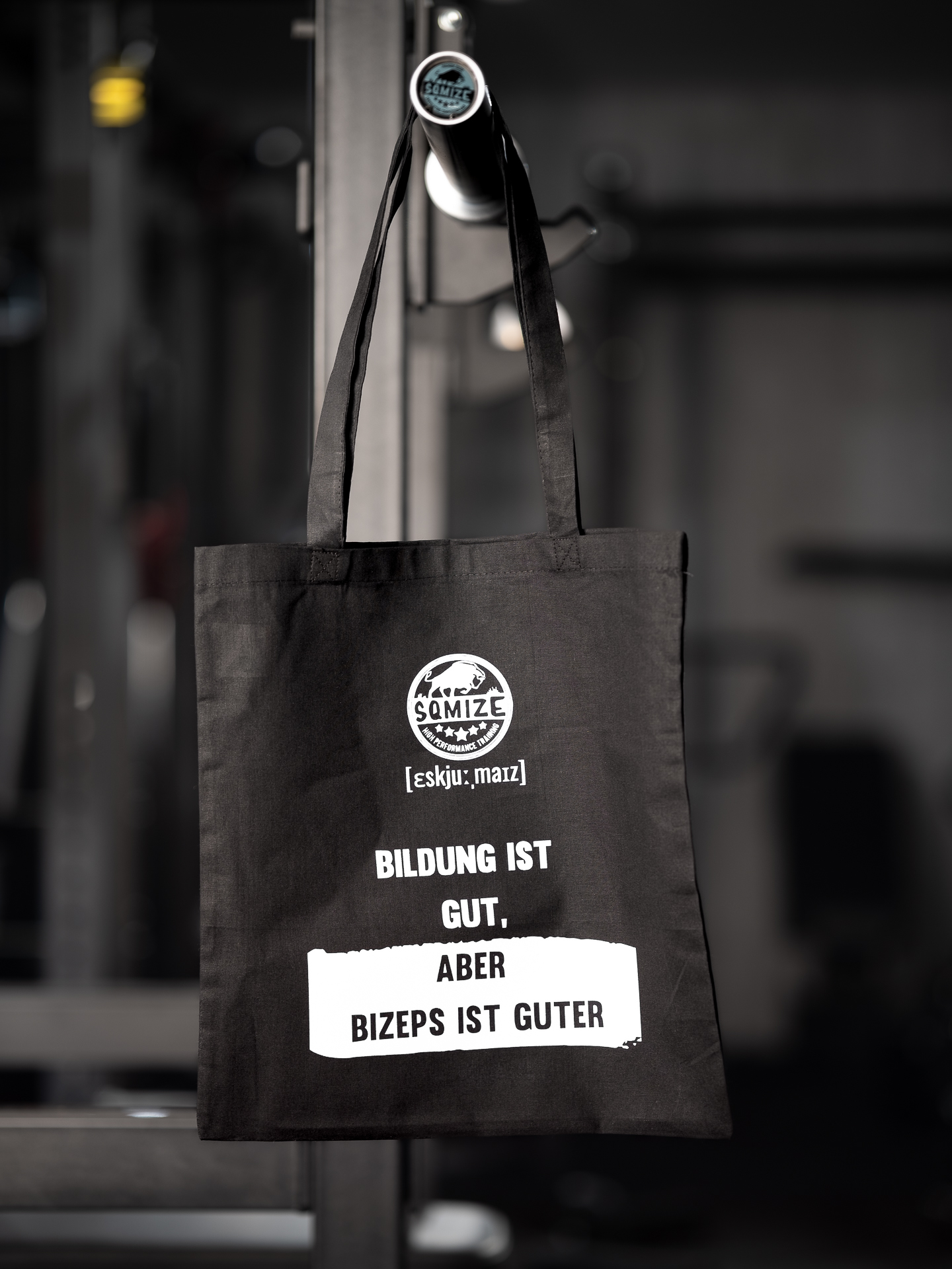 Baumwolltasche SQMIZE® schwarz, "Bildung ist gut, aber Bizeps ist guter"